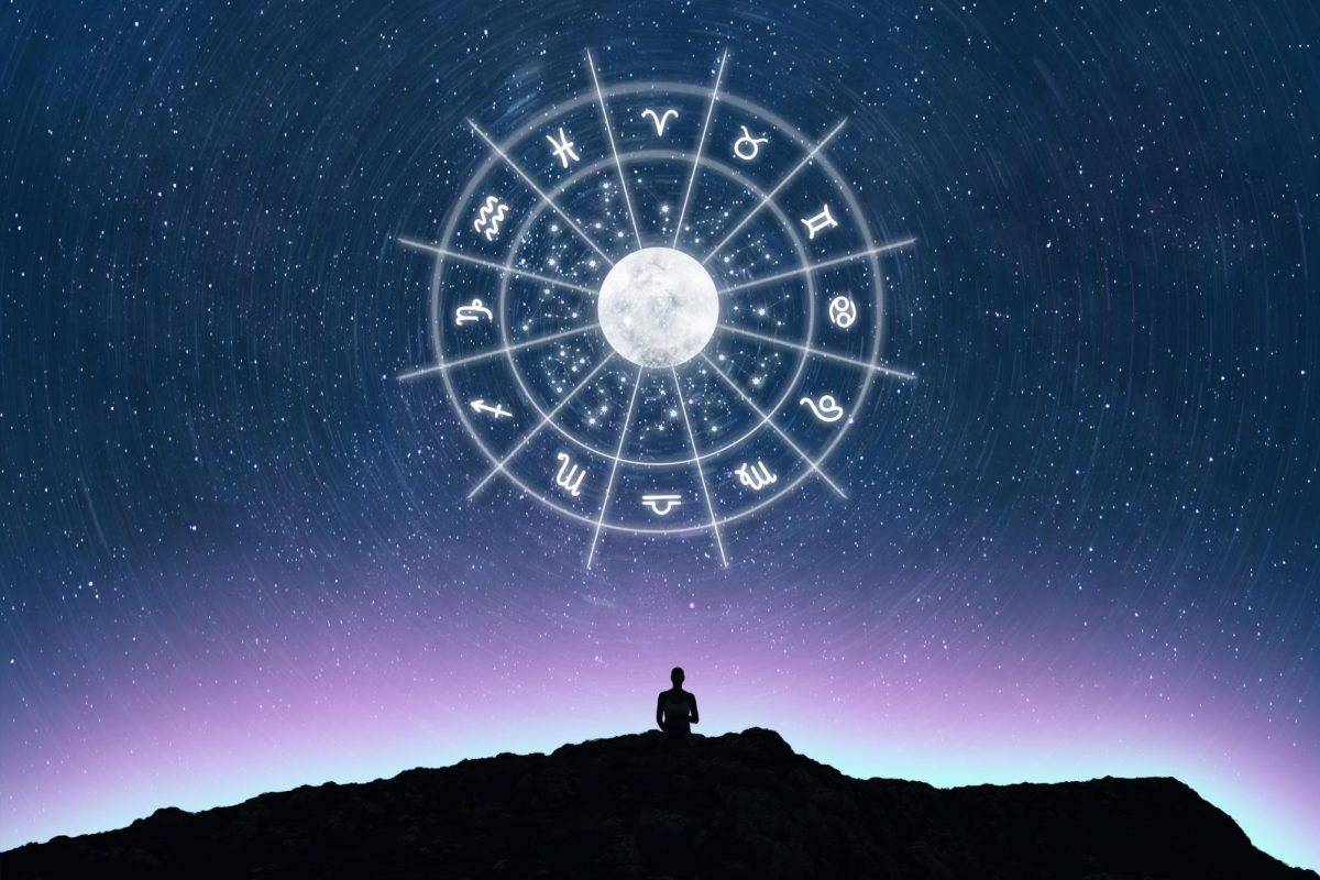 A circle of zodiac signs sits on top of a starry sky. Astrology is something many people believe makes a difference in their lives. (Getty Images)