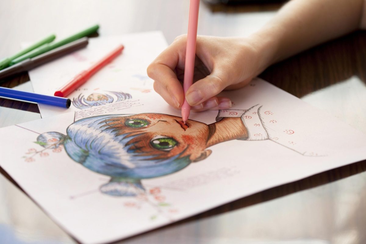 An individual holds a pink pencil as they draw an anime character. NIUs Anime Association meets 6 p.m. to 9 p.m. Tuesdays and Thursdays in Stevens Building 170A. (Courtesy of Getty Images)