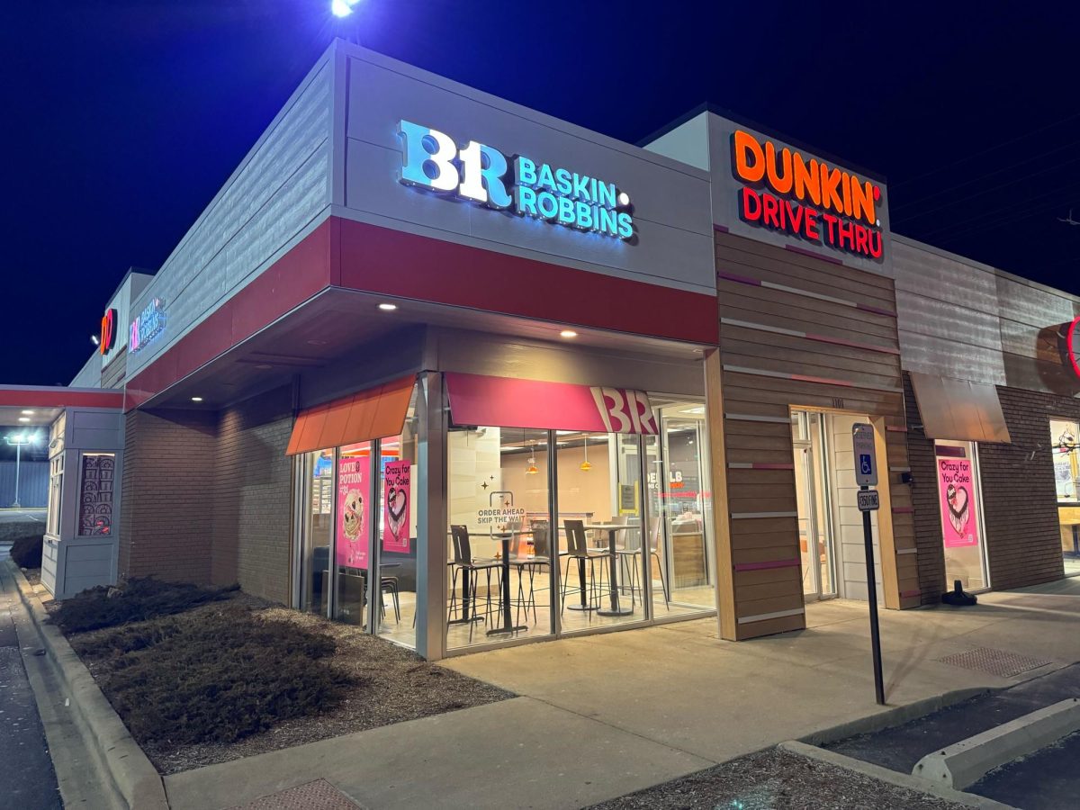 Baskin-Robbins and Dunkin’ Donut’s building sits with advertisements for their Valentine’s Day specials hung on their windows. Multiple restaurants in DeKalb are having special deals for Valentine’s Day. (Gabby Crabtree | Northern Star)
