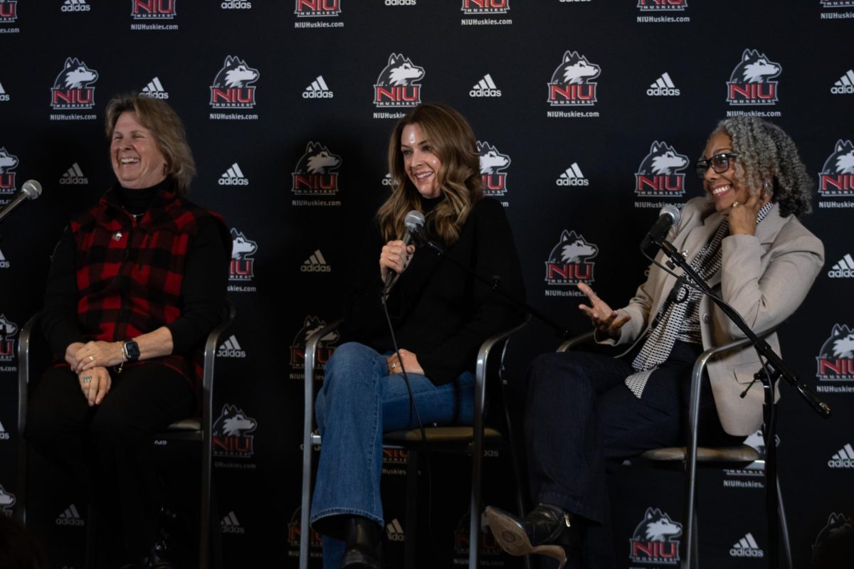Former NIU Director of Athletics Cary Groth (left), ESPN Sportscenter Anchor Nicole Briscoe and Dr. Tonya Davis sit on stage at a Women’s Excellence Panel Discussion held Feb. 7 in the south lobby of the Convocation Center. The three panelists discussed prevalent topics revolving around women’s empowerment at the event celebrating National Girls and Women in Sports Day. (Sean Reed | Northern Star)