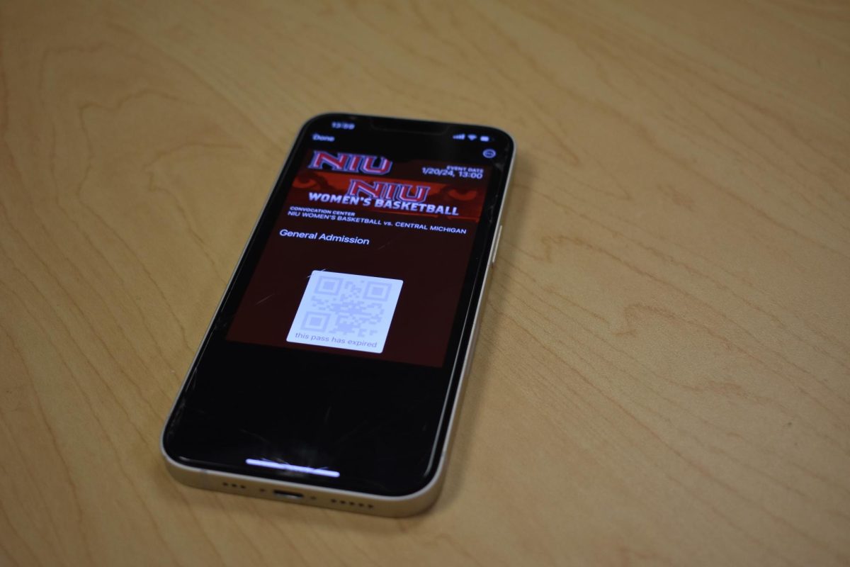 A phone shows a ticket for an NIU womens basketball game. A sporting event could be a great alternative event to an expensive dinner date on Valentines Day. (Nick Glover | Northern Star)