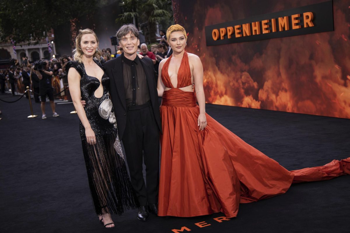Emily Blunt (from left), Cillian Murphy and Florence Pugh stand together at a premiere for Oppenheimer on July 13, 2023 in London. (Vianney Le Caer/Invision/AP, File)