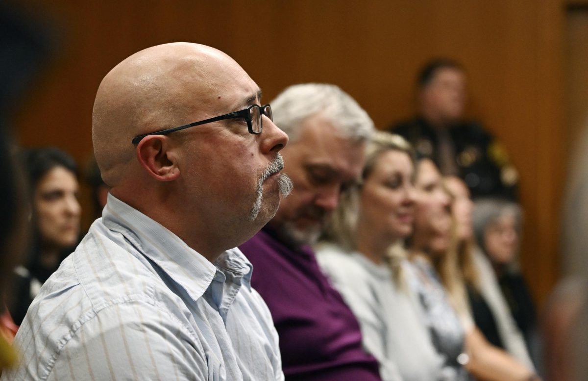Craig Shilling, father of Michigan shooting victim Justin Shilling, reacts to James Crumbley’s guilty verdict on March 14. James and Jennifer Crumbley were both found guilty of involuntary manslaughter following the mass shooting their son, Ethan Crumbley, committed Nov. 30, 2021. (Robin Buckson | Detroit News via AP Photo)