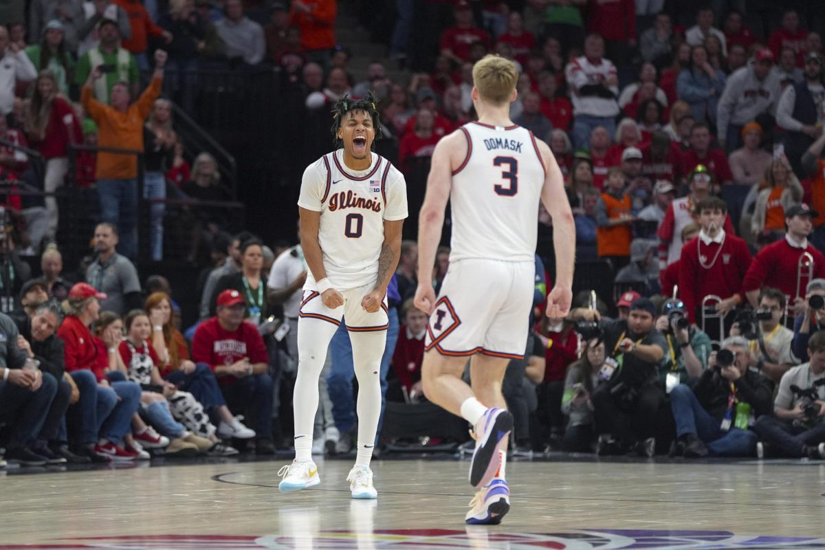 University+of+Illinois+fifth+year+guard+Terrence+Shannon+Jr.+%280%29+celebrates+with+graduate+student+guard%2Fforward+Marcus+Domask+%283%29+at+the+end+of+the+Big+Ten+Championship+game+Sunday.+Shannon+Jr.+and+Domask+are+set+to+lead+Illinois+against+Morehead+State+University+in+the+first+round+of+the+NCAA+Tournament+Thursday.+%28AP+Photo%2FAbbie+Parr%29