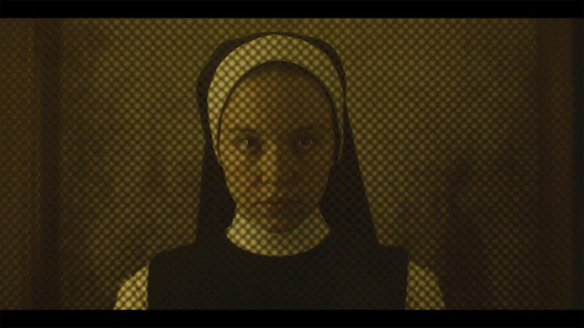 Sydney Sweeney stares straight ahead while in a nun outfit. The film “Immaculate” marks the second movie Sweeney has produced in her career. (Neon via AP)