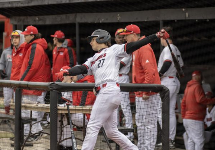 Then junior infielder/outfielder Andrew Smart (27) takes a practice swing while on-deck on March 24, 2023. NIU baseball lost its fourth straight game as it lost 7-4 to Miami University. (Northern Star File Photo)