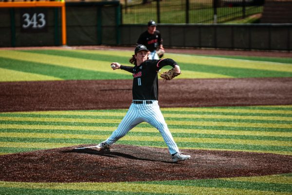 Redshirt sophomore Adam Brouwer delivers a pitch against Miami University at McKie Field at Hayden Park in Oxford, Ohio. Brouwers seven-inning shutout performance boosted the Huskies to a 1-0 win over the RedHawks on Sunday. (Ellison Neumann | Courtesy of Miami Athletics)