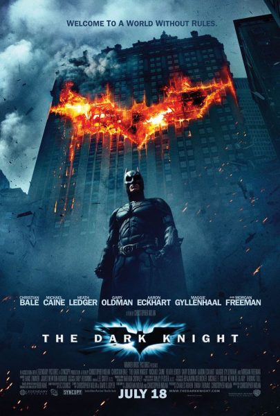 Batman stands in front of a burning Batman signal in a poster for The Dark Knight. There are several sequel movies that triumph over the first films. (Courtesy of Flickr)