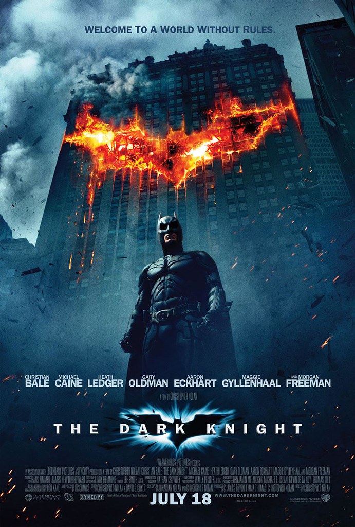 Batman+stands+in+front+of+a+burning+Batman+signal+in+a+poster+for+The+Dark+Knight.+There+are+several+sequel+movies+that+triumph+over+the+first+films.+%28Courtesy+of+Flickr%29