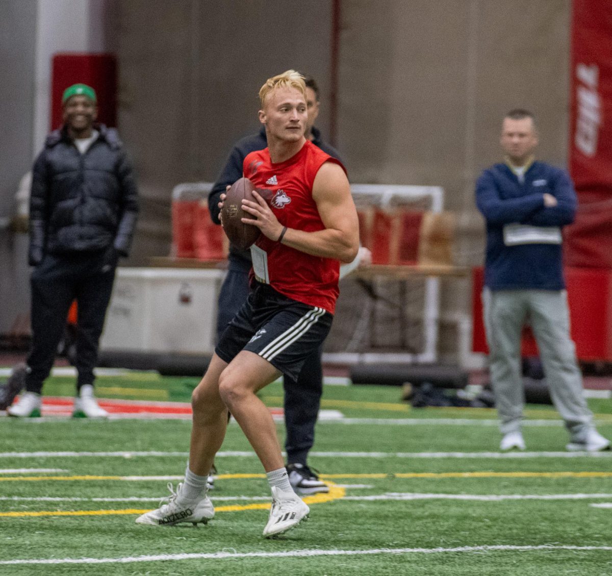 Former NIU quarterback Rocky Lombardi drops back during passing drills at Thursdays Pro Day inside the Chessick Practice Center. Lombardi worked out in front of scouts from at least 11 NFL teams. (Tim Dodge | Northern Star)