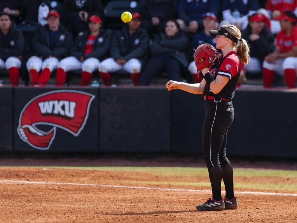 NIU senior infielder Caitlyn Shumaker throws the ball during the Huskies’ 11-2 loss to Western Kentucky University in five innings Sunday at the WKU Softball Complex in Bowling Green, Kentucky. NIU’s defeat sent the Huskies home with a 1-3 record at the Hilltopper Spring Fling. (Courtesy of Wyatt Richardson)
