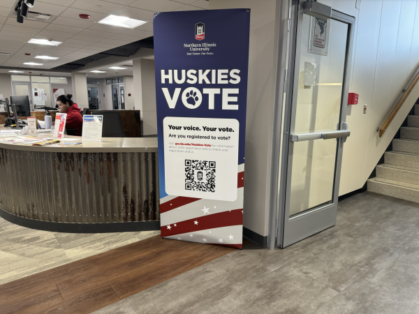A “HUSKIES VOTE” sign sits in the Holmes Student Center. Democrat Amy Murri Briel won the 76th district democratic primary election. (Gabby Crabtree | Northern Star)