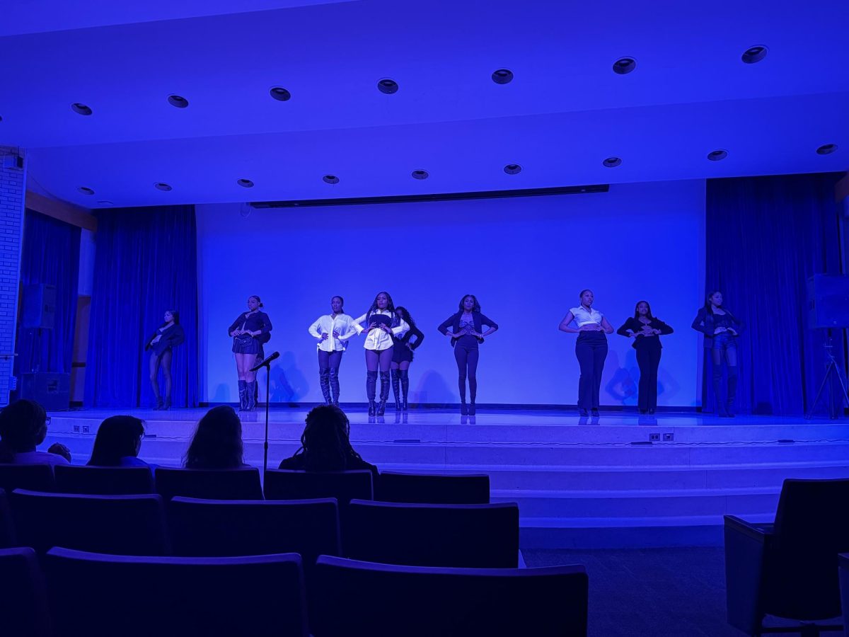 Present Perfect Modeling Organization strikes a pose during their performance at the Women’s History Month Showcase. Four Poets, One Mic hosted multiple different student organizations to help celebrate Women’s History Month on Thursday. (Gabby Crabtree | Northern Star)