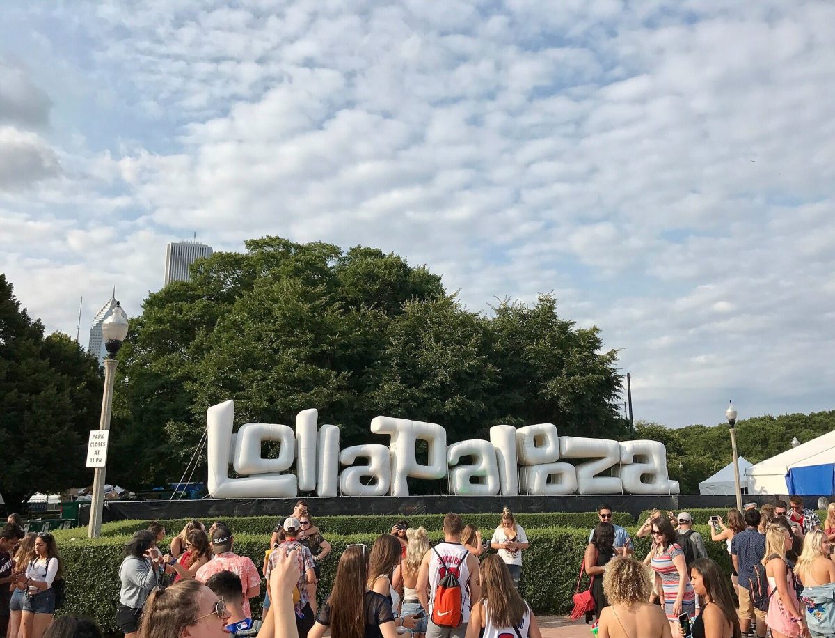 A+white+Lollapalooza+sign+sits+in+front+of+trees+in+Chicago.+Chicago+will+host+over+a+dozen+music+festivals+this+summer.+%28CC+BY-SA+4.0+%7C+Lacrossewi%29