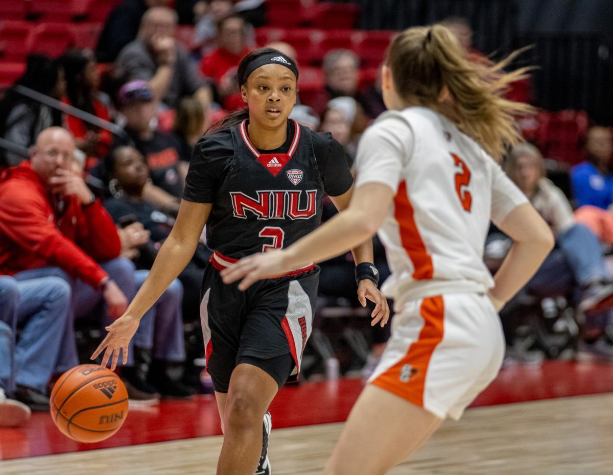 Senior+guard+Jayden+Marable+%283%29+scans+the+court+on+offense+during+the+fourth+quarter+against+Bowling+Green+State+University+on+Feb.+24.+Marable+scored+6+points+in+the+Huskies+63-60+defeat+to+Kent+State+University+in+the+MAC+Tournament+Wednesday.+%28Tim+Dodge+%7C+Northern+Star%29