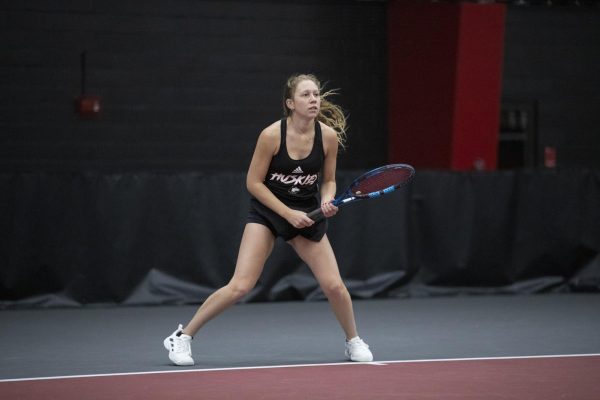 Sophomore Jenna Horne awaits a strike from her opponent at the Nelson Tennis Center at Chick Evans Field House. Womens tennis fell 1-6 to Eastern Michigan University Friday. (Courtesy of NIU Athletics)