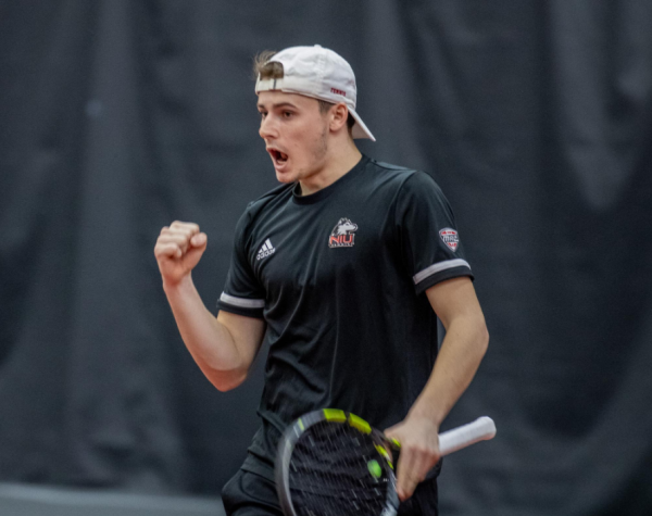 NIU sophomore Christopher Norlin celebrates during a doubles match on March 2. Norlin won in singles and doubles as NIU mens tennis defeated University of Illinois Chicago 6-1 Saturday. (Northern Star File Photo)