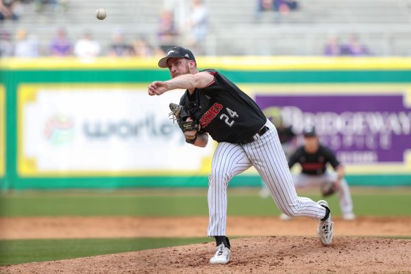 Junior pitcher Tommy Meyer throws a pitch in an NIU baseball game against Louisiana State University. Meyer gave up eight runs in three innings before the Huskies rallied to cut Toledos lead to one run in the ninth inning. (Courtesy of Jonathan Mailhes)