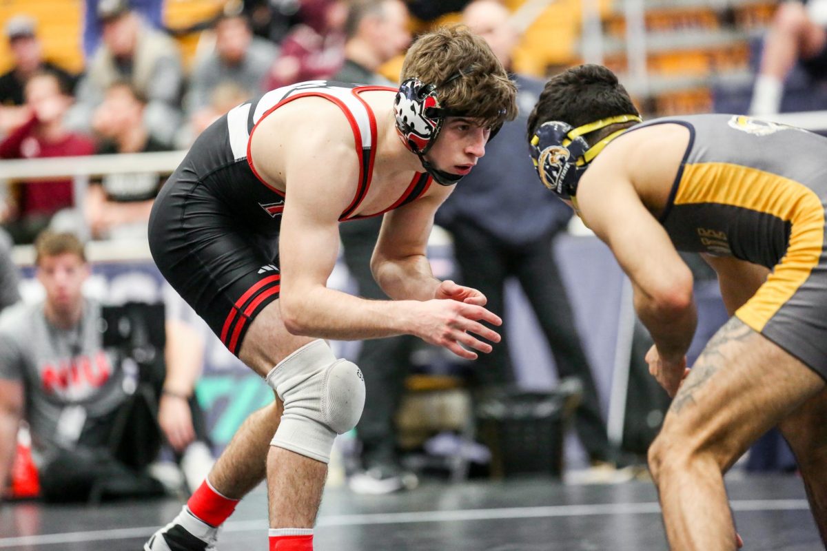 Redshirt+sophomore+Blake+West+eyes+his+Kent+State+University+opponent+in+Day+1+of+the+MAC+Championships+Friday.+West+qualified+for+the+NCAA+Tournament+after+falling+in+the+championship+round+of+the+MAC+Championships.+%28Elsye+Jones+%7C+Courtesy+of+NIU+Athletics%29