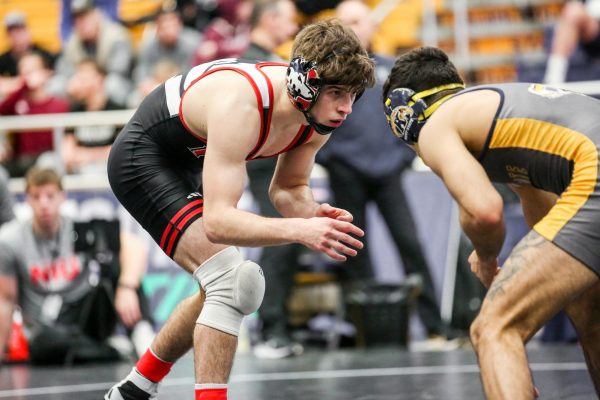 Redshirt sophomore Blake West eyes his Kent State University opponent in Day 1 of the MAC Championships Friday. West qualified for the NCAA Tournament after falling in the championship round of the MAC Championships. (Elsye Jones | Courtesy of NIU Athletics)