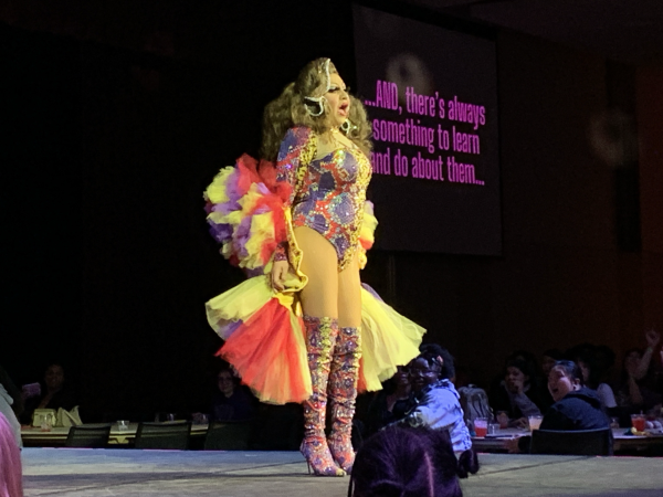 Drag Queen Miranda Kherr lip syncs Gimme! Gimme! Gimme! (A Man After Midnight) by ABBA on the runway Friday at the CAB Drag Show. Five drag queens lip synced and performed drag to pop songs in the Duke Ellington Ballroom. (Rachel Cormier | Northern Star)