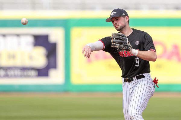 Senior infielder Jake Nelson throws a baseball in an NIU baseball game against Louisiana State University. Nelson went 2-for-3 with an RBI in the Huskies 17-8 victory over Northwestern University. (Courtesy of Jonathan Mailhes)