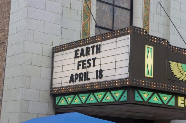 “Earth Fest April 18” is displayed on the Egyptian Theatre marquee. The film “Common Ground premiered for the first time in Northern Illinois at Earth Fest and was followed by a panel of local farmers and experts on regenerative agriculture. (Sam Dion | Northern Star)
