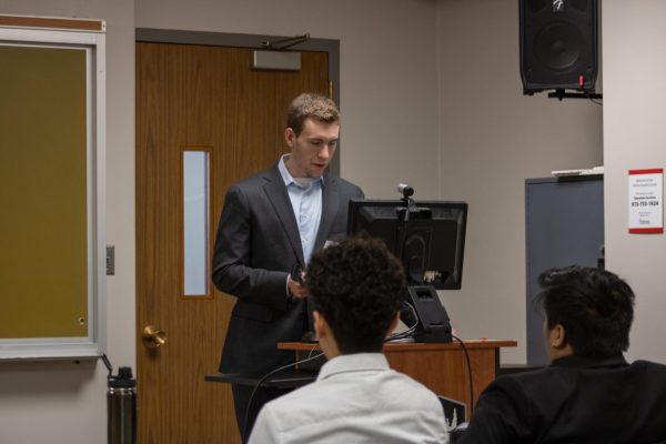 Speaker Cole Hensley stands and speaks during the State of the SGA address Friday. The State of the SGA address provided members of SGA the opportunity to reflect on their progress and accomplishments for the 2023-2024 school year. (Sean Reed | Northern Star)