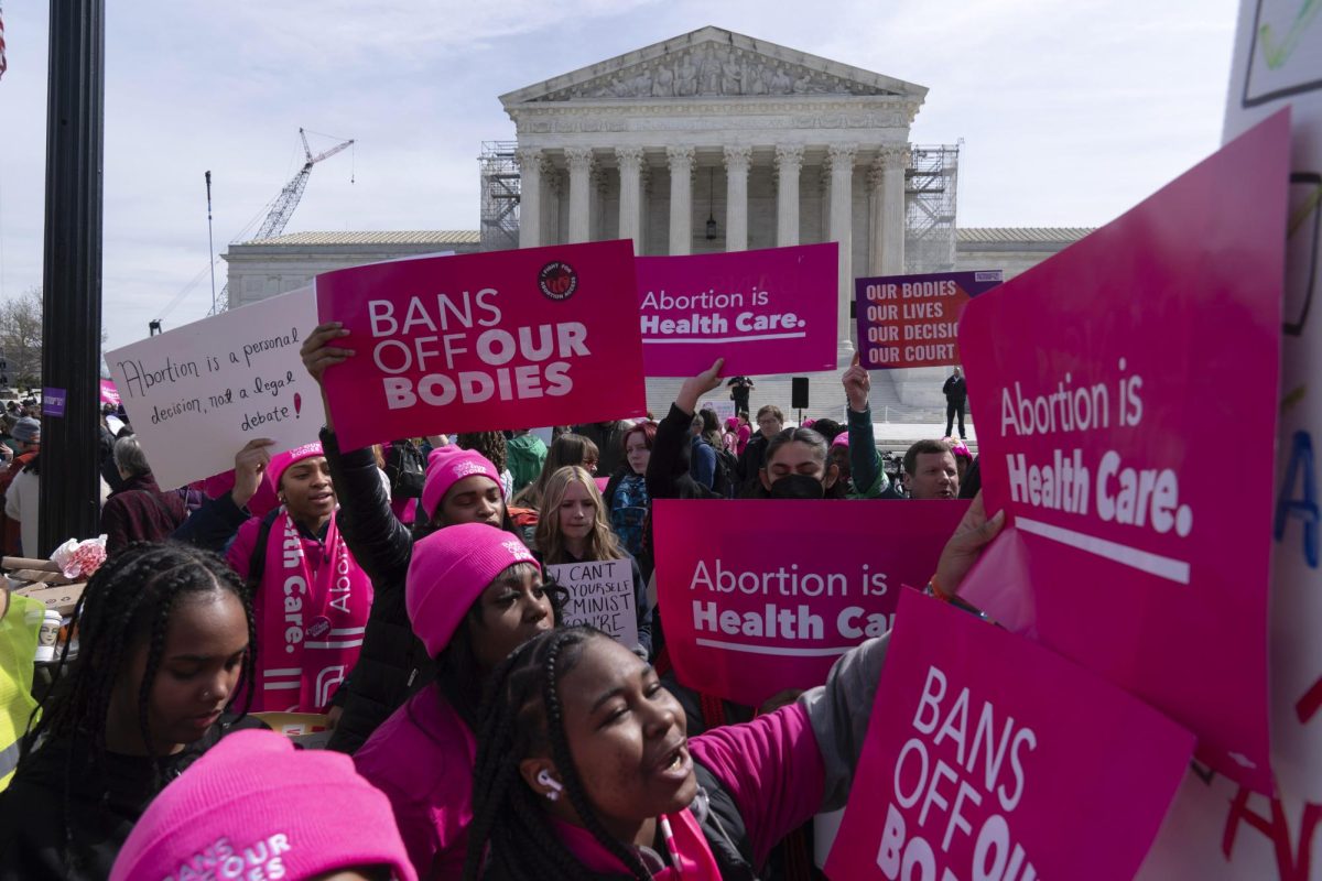 Abortion-rights+activists+protest+in+pink+March+26+outside+the+Supreme+Court+in+Washington%2C+D.C.+On+March+8%2C+France+inscribed+abortion+rights+in+its+constitution%2C+and+other+nations+should+follow+suit.+%28AP+Photo+%7C+Jose+Luis+Magana%29