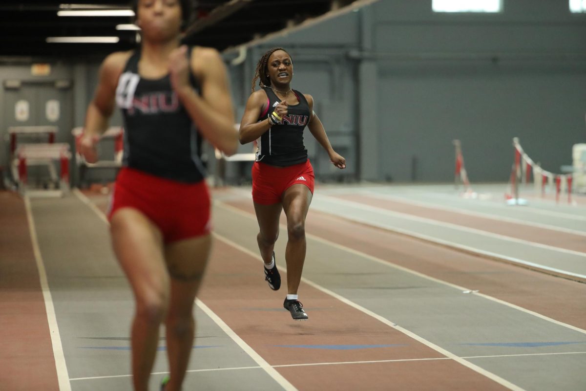Freshamn+Faith+Rouse+chases+junior+Talayssia+Sanders+on+Feb.+16+at+the+Redbird+Tune-Up.+NIU+track+and+field+earned+one+top-10+finish+at+the+Michael+Johnson+Invitational+on+Saturday.+%28Courtesy+of+Illinois+State+Athletics%29