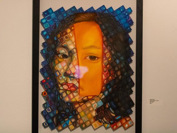 A mixed media art piece from Olivia Hucke is displayed at the Annual Juried Blick Art Materials Ars Nova Exhibition. The exhibition has been open from 10 a.m. to 4 p.m. since April 1, and will remain open until April 18, in the Jack Olson Gallery at Jack Arends Hall. (Tim Dodge | Northern Star)