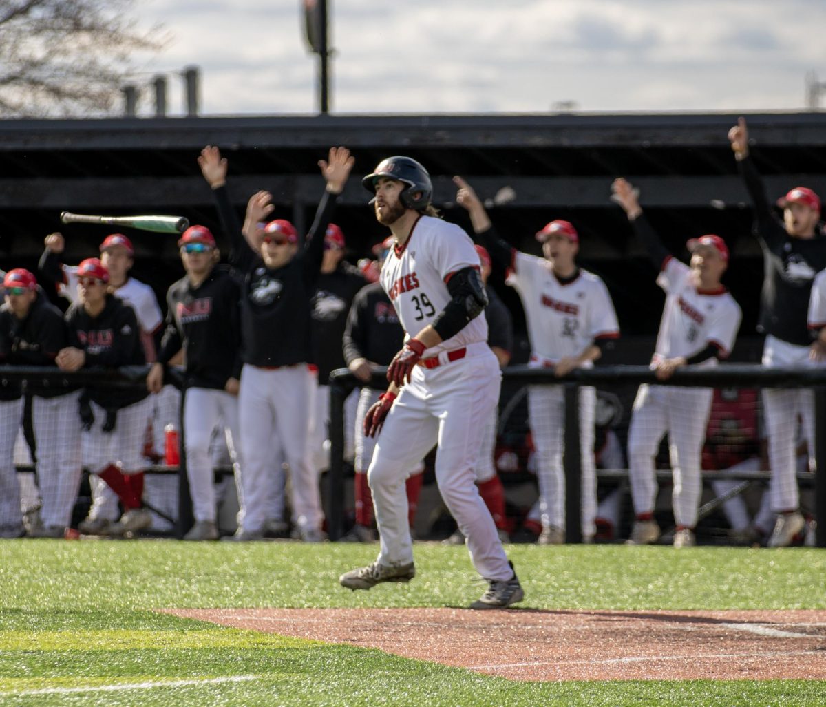 Junior left fielder CJ Cepicky (39) flips his bat after hitting a two-run home run to left field during the fourth inning against Bowling Green. Cepicky’s home run cut the Falcons lead to 4-3. (Tim Dodge | Northern Star)