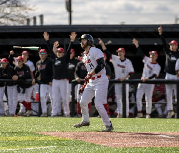 Junior left fielder CJ Cepicky (39) flips his bat after hitting a two-run home run to left field during the fourth inning against Bowling Green. Cepicky’s home run cut the Falcons lead to 4-3. (Tim Dodge | Northern Star)