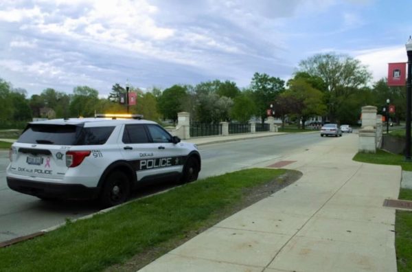 A DeKalb police car sits parked on NIUs campus. Crimes such as stalking and battery were reported in March 2024 on NIUs campus. (Sean Reed | Northern Star)