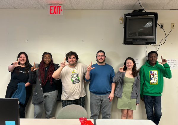 The Northern Star lifestyle section hold up finger L’s for lifestyle. Lifestyle Editor Nick Glover is graduating and leaving the Star. (Jenny Javkhlantugs | Northern Star)