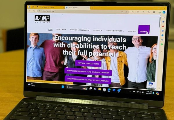 A laptop sits with RAMP’s homepage open. RAMP is a center for independent living for people with disabilities. (Gabby Crabtree | Northern Star)