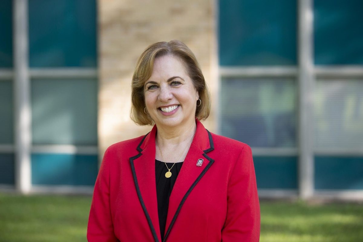 Laurie Elish-Piper stands smiling. Elish-Piper has taken on the role of Executive Vice President and Provost at NIU. (Courtesy of Mia Hannon)