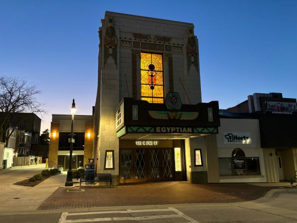 The Egyptian Theatre, 135 N. Second St., has its lights on while the sun sets around it. The Egyptian Theatre will host the first annual Earth Fest Thursday. (Nick Glover | Northern Star)