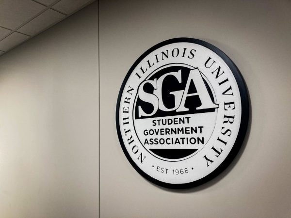 The Student Government Association sign hangs on a wall in the Holmes Student Center in the OASIS pit in 2022. SGA is hosting a special election on Wednesday for 10 open legislative seats. (Northern Star File Photo)