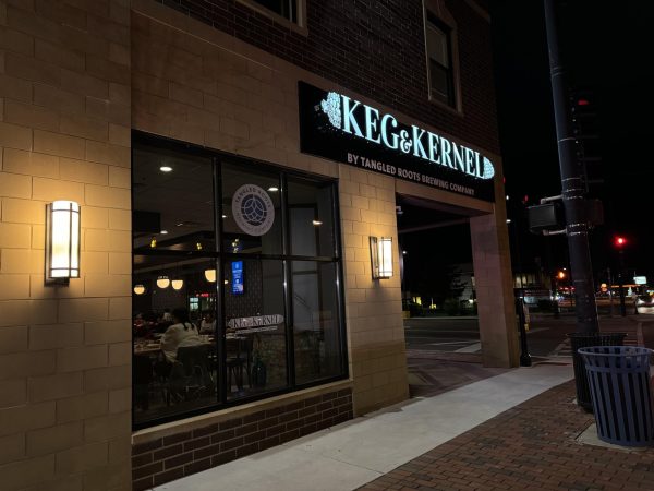 Keg & Kernel, located at 106 E. Lincoln Highway, sits open on Wednesday night. Keg & Kernel has announced it will be permanently closing April 28. (Gabby Crabtree | Northern Star)