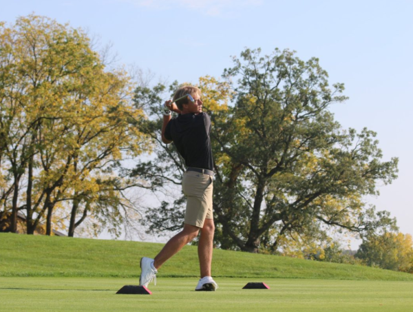 Junior Felix Krammer watches his shot at the Badger Invitational in October of 2023. NIU mens golf finished tied for seventh out of 18 teams at the Robert Kepler Intercollegiate on Sunday. (Northern Star File Photo)