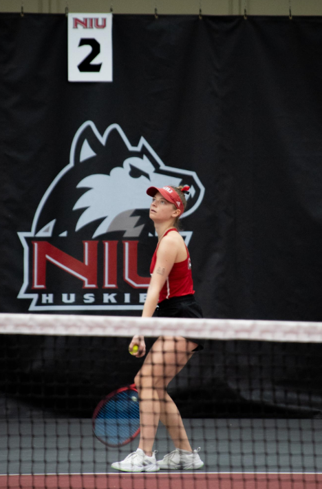 Senior+Anastasia+Rakita+prepares+to+serve+on+March+9+at+the+Nelson+Tennis+Center+at+Chick+Evans+Field+House.+NIU+womens+tennis+defeated+Bowling+Green+State+University+6-1+on+Sunday.+%28Northern+Star+File+Photo%29