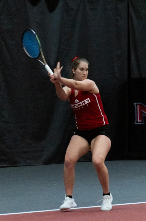 NIU junior Reagan Welch prepares to return a serve on March 9. Welchs singles win earned the only point for NIU womens tennis Sunday in a 6-1 loss to Western Michigan University. (Northern Star File Photo)