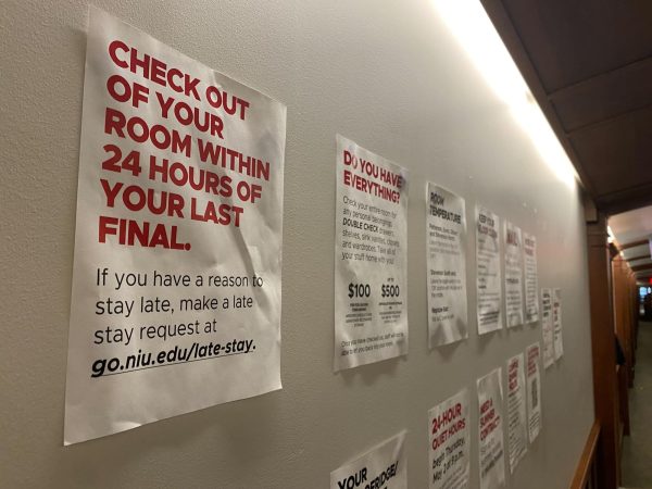Posters with dorm move out instructions hang in Gilbert Hall. When moving out for the summer, it is important to be prepared and follow all of the requirements. (Brynn Krug | Northern Star)