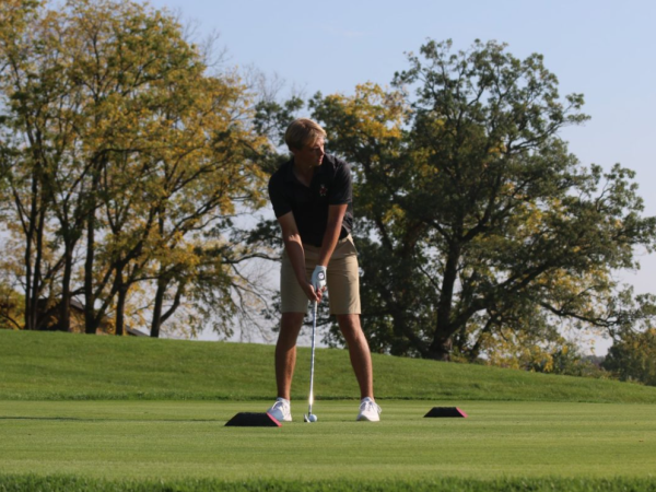 Junior Felix Krammer lines up a shot at the Badger Invitational in October of 2023. Krammer, along with junior Ben Sluzas, was voted to the All-MAC Second Team for the 2023-24 season. (Northern Star File Photo)