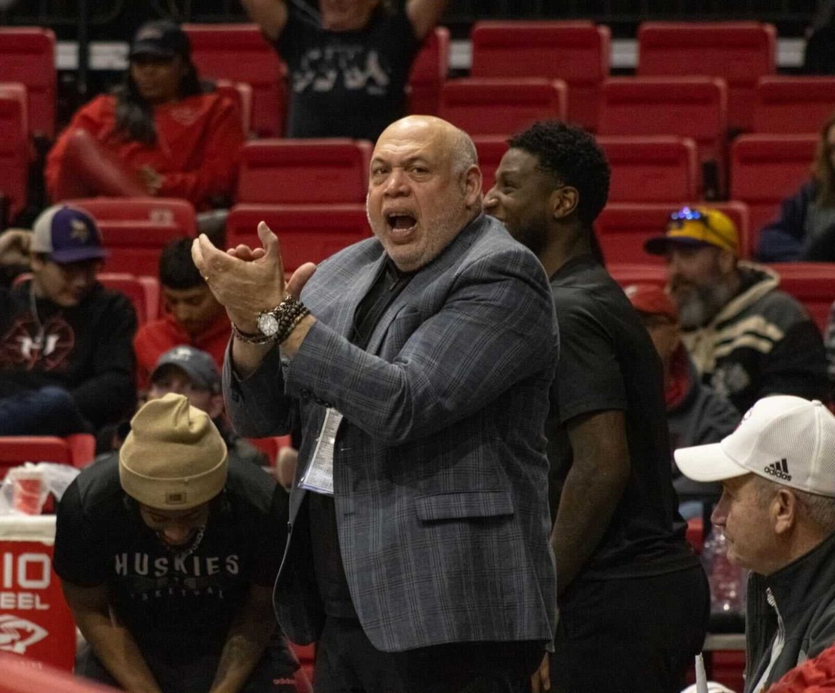 Sean Frazier, NIU’s vice president and director of athletics and recreation, cheers with the rest of the crowd during an NIU men’s basketball game against Eastern Michigan University on Feb. 3 at the Convocation Center. NIU Athletics announced a contract extension for Frazier on Friday that will keep him at NIU through June 30, 2027.