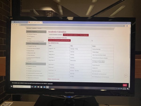 A computer in the Founder’s Memorial Library displays NIU’s 2024-2025 academic calendar. Some universities outside the United States rely on year-round academic calendars different from the calendar used at most American universities, like NIU. (Lucy Atkinson | Northern Star)