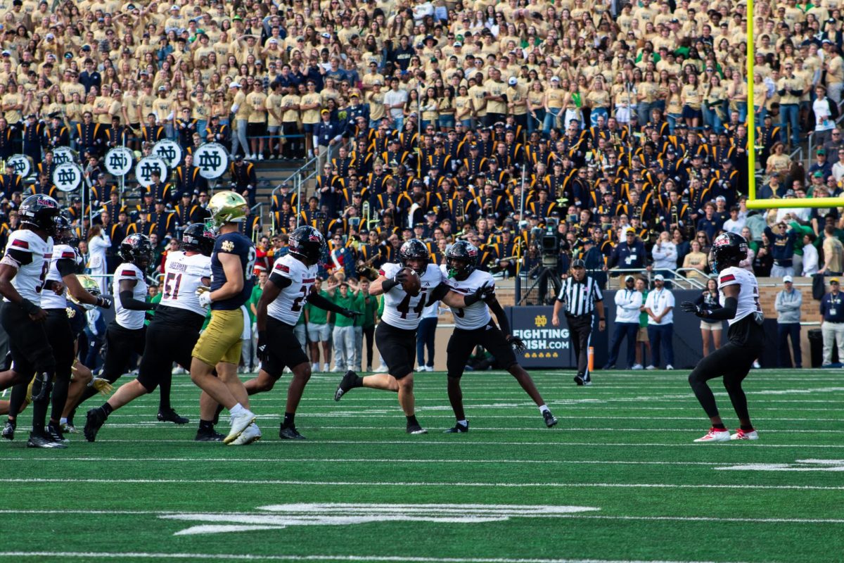 Senior linebacker Christian Fuhrman (44) celebrates after intercepting a pass thrown by Notre Dame senior quarterback Riley Leonard (13) near the end of the first quarter. Leonard threw two interceptions during the game, the first in the first quarter and the second in the fourth quarter. (Totus Tuus Keely | Northern Star)
