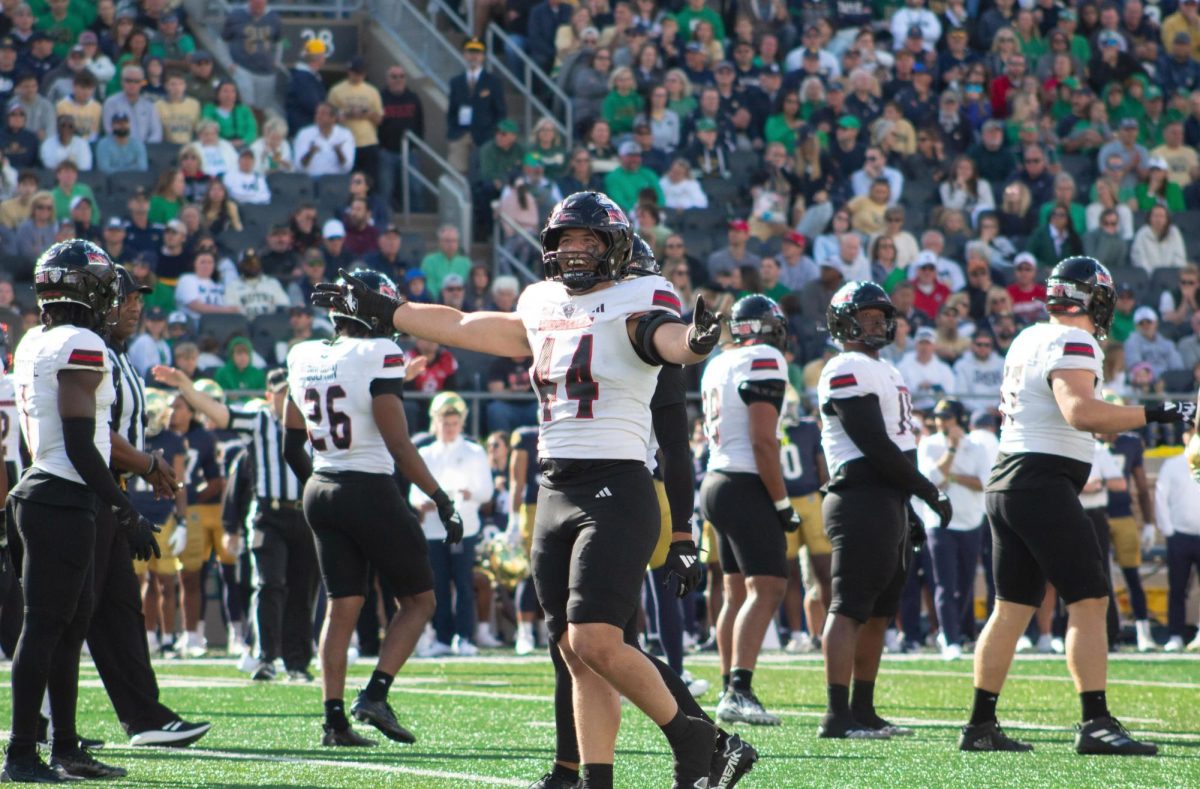 NIU senior linebacker Christian Fuhrman (44) eggs on the boos of the crowd in the final minutes of the first half of NIU’s stunning upset of then-No. 5 University of Notre Dame on Saturday at Notre Dame Stadium. NIU was ranked No. 25 in The Associated Press Top 25 poll released Tuesday. (Totus Tuus Keely | Northern Star)