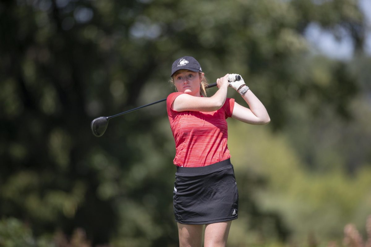 Senior Caroline Kent watches her drive from the tee box on her follow-through. Kent tied for 20th place at the Redbird Invitational Monday as the Huskies finished in a tie for fifth place. (Courtesy of NIU Athletics)